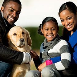 Family with Golden Retriever